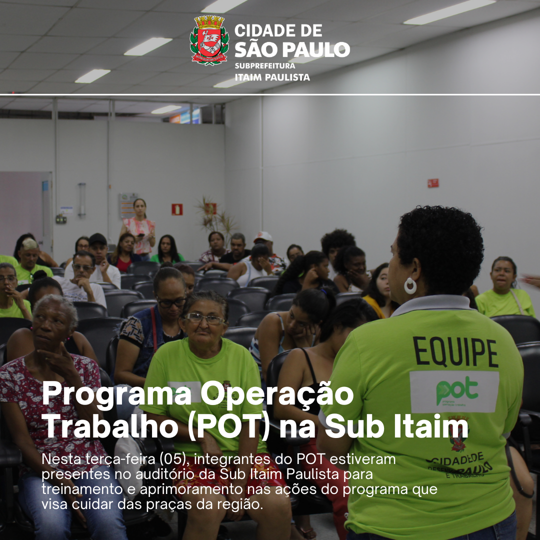 Foto da reunião do Programa Operação Trabalho (POT) na Subprefeitura Itaim Paulista. Há uma pessoa da equipe em pé falando enquanto as outras permanecem sentadas, ouvindo atentamente.