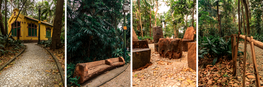 Um retângulo com quatro fotografias dentro, separadas por uma fina linha branca. A primeira foto sendo de uma casa amarela com janelas verdes, a segunda foto dois bancos feitos de tronco de árvore, a terceira foto de troncos de árvores em formas lembrando uma cadeira, a quarta foto árvores com folhas verdes e úmidas.