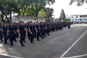 #PraTodosVerem - A imagem mostra GCMs perfilados em ensaio de desfile, na Academia de Formação em Segurança Urbana.