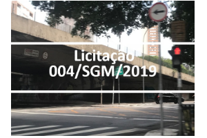 Imagem do baixo de viaduto da cidade de São paulo, no meio escrito Licitação 004/SGM/2019