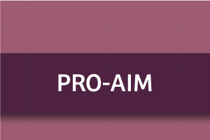 #PraCegoVer: O título "Pro-Aim" está no centro da imagem, destacado por uma faixa roxa. O fundo é roxo claro, simples, com quadriculados grandes.