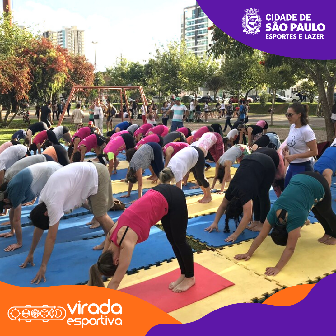 #PraCegoVer- Na imagem, grupo de mulheres se exercitando em uma aula de pilates. No canto superior direito, o brasão da Secretaria Municipal de Esportes e Lazer. No canto inferior esquerdo, o logo da Virada Esportiva.